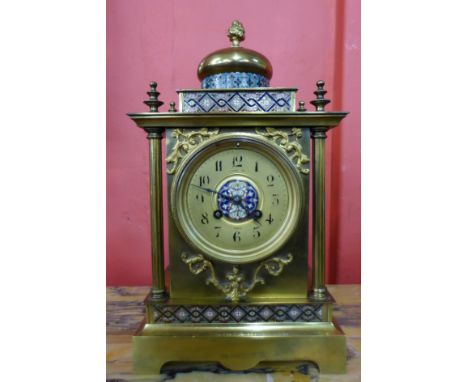 A 19th Century French brass and enamelled mantel clock, the dial signed Long Co., Paris