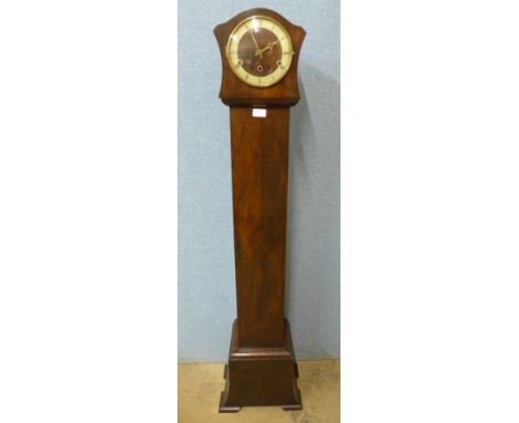 An oak dwarf longcase clock