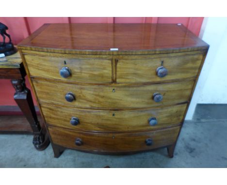 A George IV mahogany bow front chest of drawers