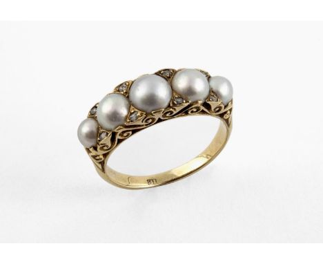 A VICTORIAN PEARL AND DIAMOND RING mounted with five graduated half pearls, with rose-cut diamond highlights in 18ct yellow g