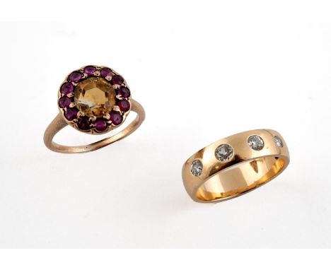 A GOLD AND DIAMOND RING set with four circular-cut diamonds, size L 1/2, together with a citrine and ruby cluster ring, the o