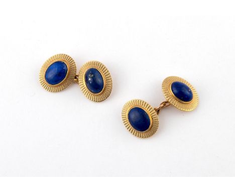 A PAIR OF LAPIS LAZULI AND 9CT GOLD CUFFLINKS each link mounted with an oval lapiz lazuli cabochon within a gold surround wit
