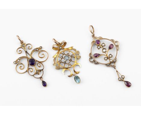 AN AQUAMARINE AND SEED PEARL PENDANT the 9ct gold lattice work mount set with a circular-cut aquamarine surrounded by small p