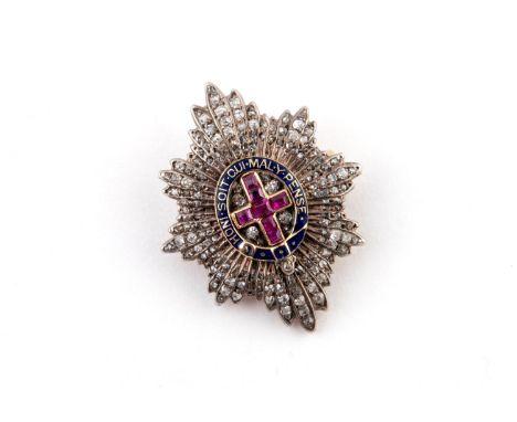 A DIAMOND, RUBY AND ENAMEL REGIMENTAL BROOCH FOR THE COLDSTREAM GUARDS set with calibre-cut rubies and set overall with rose-