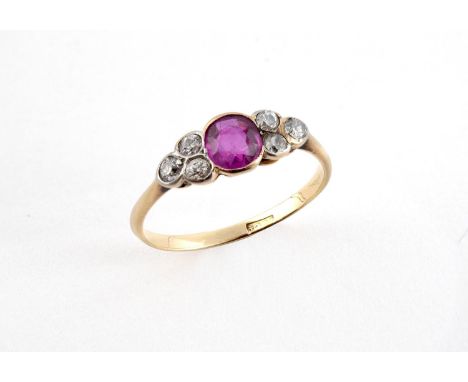 A RUBY AND DIAMOND RING the circular-cut ruby is set with three round old-cut diamonds to each shoulder, in 18ct yellow gold.