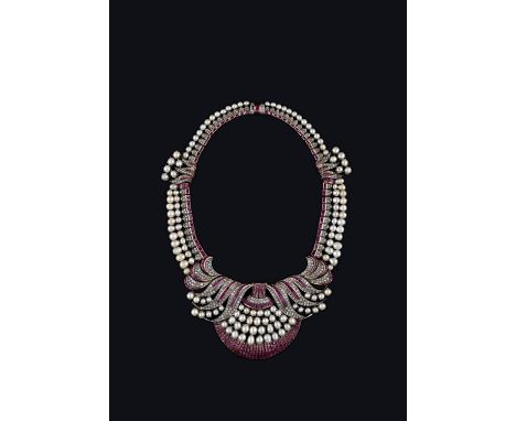 A RUBY, DIAMOND AND NATURAL PEARL NECKLACE the scrolling centrepiece mounted with calibre-cut rubies, circular-cut diamonds a
