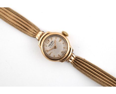 A LADY'S 9CT. GOLD WRISTWATCH the circular dial with two Arabic numerals at 12 and 6 o'clock and dagger numerals, on an integ