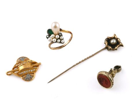 A BLACK ENAMEL AND PEARL SET STICK PIN set in gold, with locket compartment to the reverse containing hair, together with thr