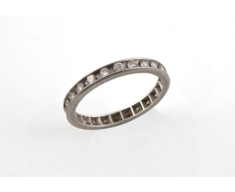 A DIAMOND FULL CIRCLE ETERNITY RING mounted with circular-cut diamonds. Size M 1/2