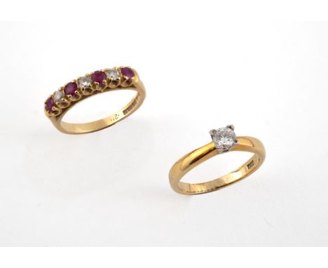 A DIAMOND SOLITAIRE RING the brilliant-cut diamond is set in 18ct gold, size K 1/2, together with a ruby and diamond half hoo