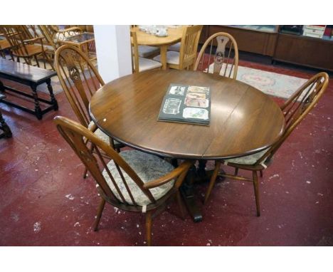 Ercol table & 4 chairs including 2 carvers