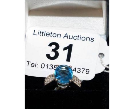 Silver & Blue topaz ring
