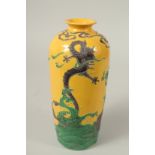 A CHINESE YELLOW GROUND FAHUA-TYPE POTTERY VASE, with raised decoration of dragon, kylin, and