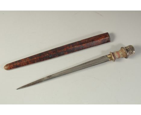 AN INDIAN MUGHAL DAGGER, with openworked silver and possibly snakeskin overlaid handle, the silver inset with ruby, with wood