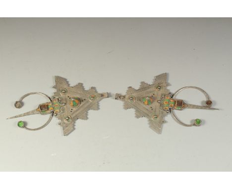 TWO FINE LARGE NORTH AFRICAN MOROCCAN OR ALGERIAN ENAMELLED SILVER CLOAK ORNAMENTS, 18.5cm long (2).