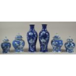 A COLLECTION OF SIX CHINESE BLUE AND WHITE 'PRUNUS' PORCELAIN PIECES, comprising two pairs of jars