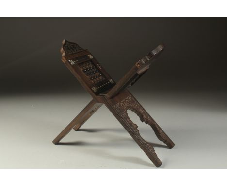 A FINE 19TH CENTURY MOTHER OF PEARL INLAID ENGRAVED WOODEN QURAN STAND - possibly Ottoman or Egyptian, 34cm long.