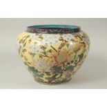 A LARGE CHINESE YELLOW GROUND CLOISONNE JARDINIERE, with floral decoration, the interior and base