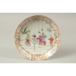 AN 18TH CENTURY CHINESE PORCELAIN DISH, painted with figures and heightened with gilt highlights,
