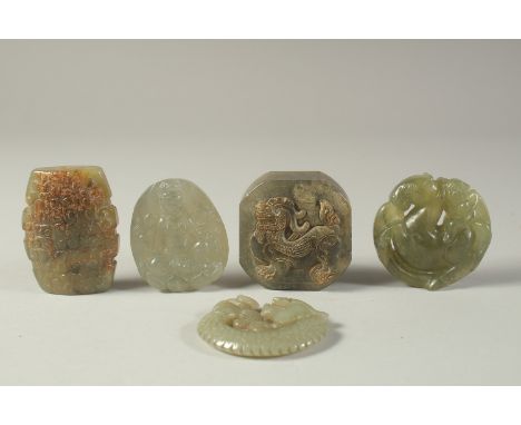 A COLLECTION OF FIVE CARVED JADE PIECES, (5).