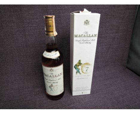 A bottle of The Macallan Seven Year Old Single Highland Malt Scotch Whisky, matured in sherry wood, imported by Giovinetti &a