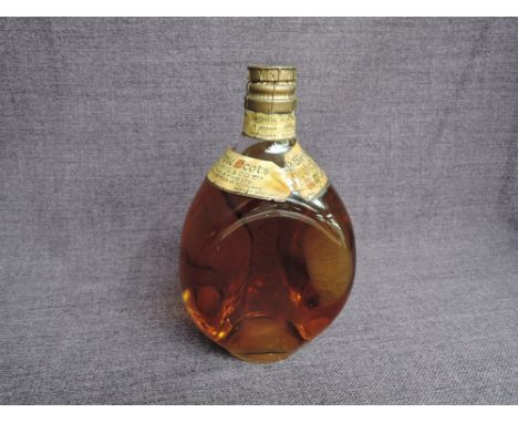 A bottle of John Haig Dimple Blended Scotch Whisky, no capacity stated, by appointment to the late King George V
