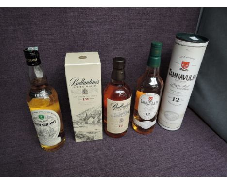 Three bottles of Single Malt and Pure Malt Scotch Whisky, Tamnavulin 12 Year Old, 40% vol, 70 cl in card tube, Ballantines 12