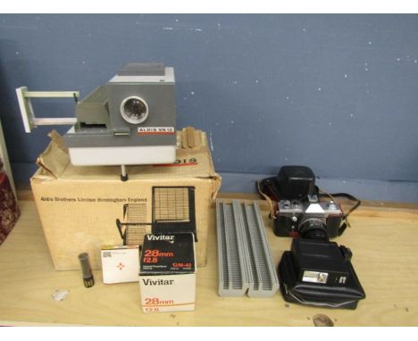 Vintage projector (display purposes only), Praktica camera and photo albums etc&nbsp;