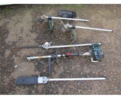 A Webb loop handle petrol multi cutter with bush cutter, grass trimmer, chain saw and hedge cutter attachments plus instructi