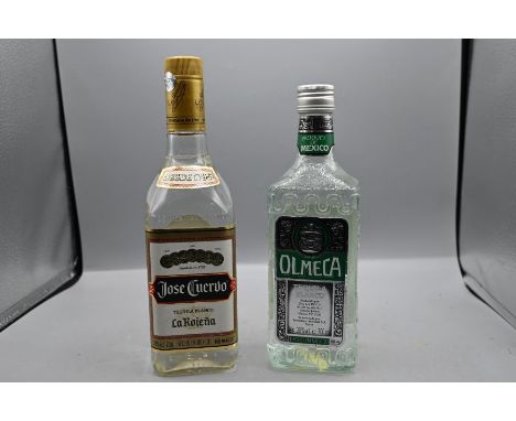 Two bottles of tequila to include Jose Cuervo and Olmeca