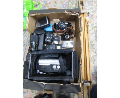 A box camera's, video recorder, lens etc plus an easel