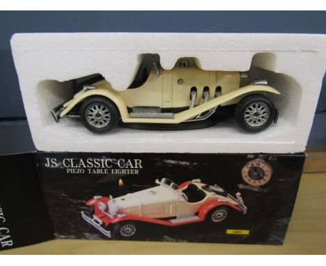 A boxed table lighter in form of classic car