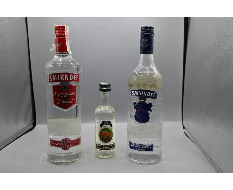 2 Bottles and one small bottle of vodka to include one Smirnoff triple distiller 1l, one Smirnoff Export strength 1l and one 