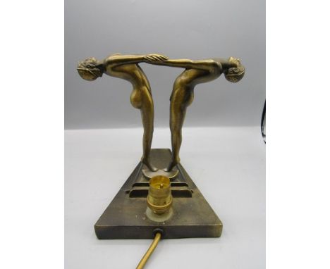 Art deco brass lamp with naked figures