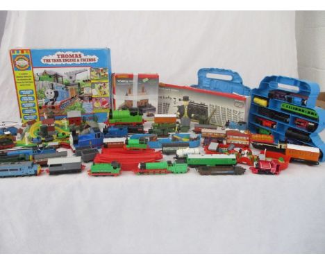 A collection of Thomas the Tank Engine die cast pieces along with various other model vehicles etc.
