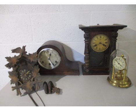 A collection of various clocks including a Cuckoo clock. (A/F)