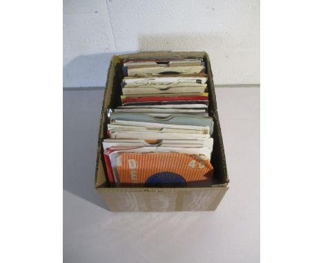 A collection of 7" vinyl records including The Yardbirds, The Rolling Stones, The Kinks, Free, Black Sabbath, Jimi Hendrix, F