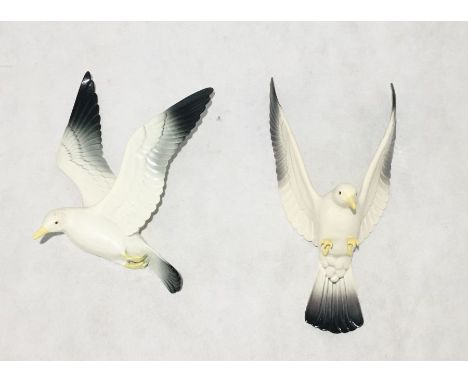 Two ceramic seagull wall ornaments one marked Bretby