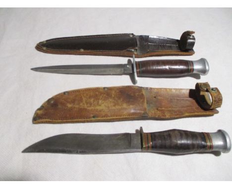 An Underhill &amp; Co. knife in leather sheath along with a Commando style dagger( possibly by William Rogers)