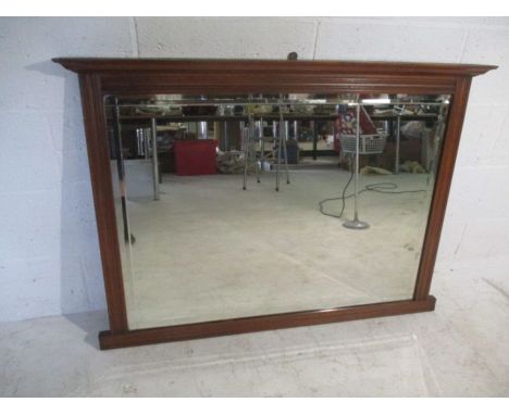 An Edwardian over mantle mirror.