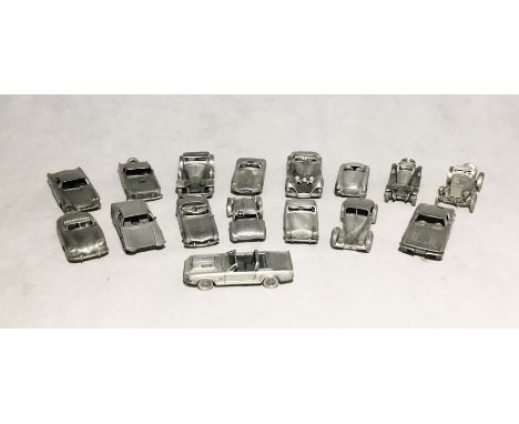 Sixteen Danbury Mint pewter models of vehicles including Mercedes Benz 500-K, Allard J2X, Bugatti 57SC Atlantic, Jaguar XKE R