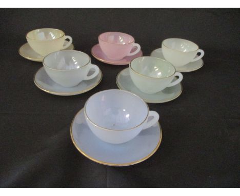 An Arcopol part tea set with 6 multi coloured cups and saucers