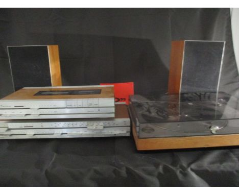A Bang &amp; Olufsen hi fi system comprising of Beogram 1202 turntable, Beocord 900 cassette player, Beomaster receiver and B