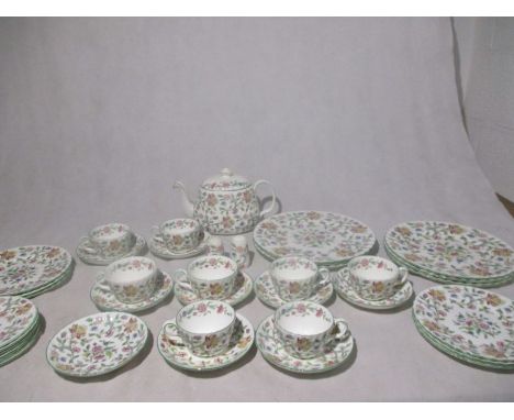 A Minton Haddon Hall part tea set including a six plates, six trios, six side plates, teapot and salt and pepper shaker etc h