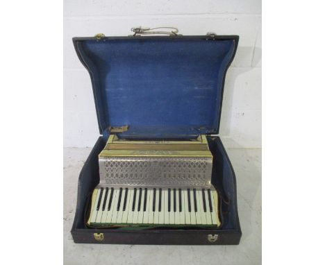 A Sivori Italian piano accordion in case