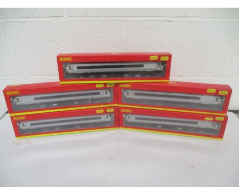 A collection of five boxed Hornby OO gauge rolling stock Pendolino coaches including Standard Buffet Coach, two Standard Open