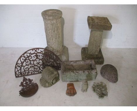 A collection of concrete garden ornaments included a bird bath, trough, pillar, gnome etc