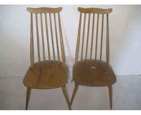 A pair of stickback Ercol chairs.