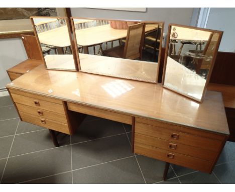 Mid Century teak dressing table with seven drawers by Arthur Wood 167 x 43 cm 