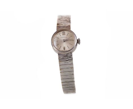 LADY'S CERTINA NINE CARAT WHITE GOLD MANUAL WIND WRIST WATCH,the round silvered dial with applied baton and Arabic hour marke
